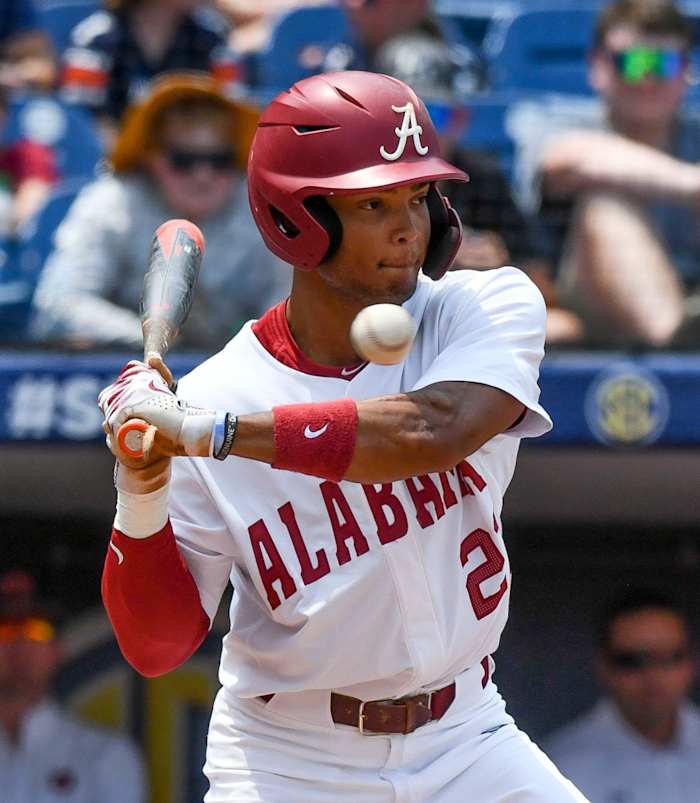 Alabama hitter Andrew Pinckney (21) takes a pitch high during the SEC Tournament elimination game Thursday, May 25, 2023, at the Hoover Met. Alabama defeated Auburn 7-4 to advance.
